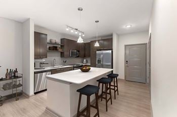 A modern kitchen with a white island